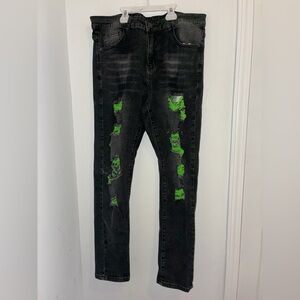 Black Distressed Skinny Jeans with Neon Green Patch Detail
